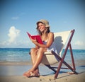 Woman Relaxing on the Beach Tranquil Tropical Concept