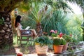 Woman is relaxing in a beautiful garden