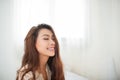 Woman Relaxing in bed and relaxing in her living room Royalty Free Stock Photo