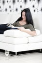 Woman relaxing with a book and wine Royalty Free Stock Photo
