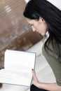 Woman relaxing with a book and wine Royalty Free Stock Photo