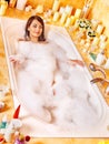 Woman relaxing at bubble bath. Royalty Free Stock Photo