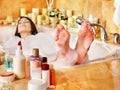Woman relaxing at bubble bath. Royalty Free Stock Photo