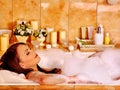 Woman relaxing at bubble bath. Royalty Free Stock Photo