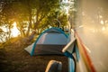 Woman Relaxing At Campsite Near RV