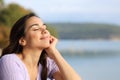 Woman relaxing with closed eyes in the mountain Royalty Free Stock Photo