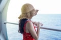 Woman relaxing on Cruise ship enjoying ocean view from balcony Royalty Free Stock Photo