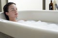 Woman Relaxing With Eyes Closed In Bathtub Royalty Free Stock Photo