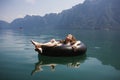 Woman relaxing on a floating ring