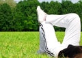 Woman relaxing on grass