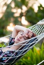 Woman relaxing in a hammock Royalty Free Stock Photo