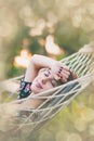 Woman relaxing in a hammock Royalty Free Stock Photo