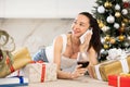 woman is relaxing at home with glass of wine during New Year holidays Royalty Free Stock Photo