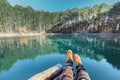 Woman relaxing by the lake Royalty Free Stock Photo