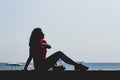 Woman relaxing near the Black sea