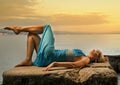 Woman relaxing near the sea Royalty Free Stock Photo