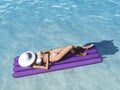 Woman relaxing in pool.
