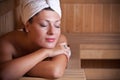 Woman relaxing in the sauna