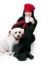 Woman relaxing with a small pet dog Royalty Free Stock Photo