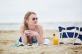 Woman relaxing and sunbathing on beach Royalty Free Stock Photo