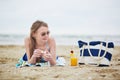 Woman relaxing and sunbathing on beach Royalty Free Stock Photo