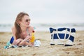 Woman relaxing and sunbathing on beach Royalty Free Stock Photo