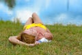Woman relaxing sunbathing on the grass Royalty Free Stock Photo