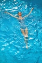 Woman Relaxing In Swimming Pool Water. Summer Holidays Vacation. Royalty Free Stock Photo