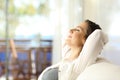 Woman relaxing on vacations in an apartment Royalty Free Stock Photo