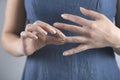 Woman remove the wedding ring