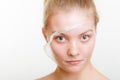 Woman removing facial peel off mask. Royalty Free Stock Photo