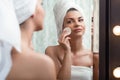 Woman removing makeup Royalty Free Stock Photo