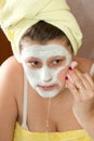 Woman removing mask Royalty Free Stock Photo