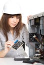 Woman repairing the computer Royalty Free Stock Photo