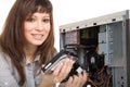 Woman repairing the computer