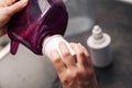 Woman replacing filter in a water pitcher. Female hand removes an old tap water purification cartridge from a jug. Royalty Free Stock Photo