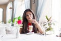 A woman in a restaurant is drinking cocktail Royalty Free Stock Photo