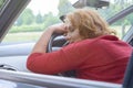 Woman is resting in the car Royalty Free Stock Photo