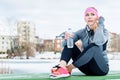 Woman resting from jogging or sport on winter day Royalty Free Stock Photo