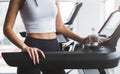 Woman resting after running on track, closeup, crop