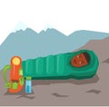 Woman resting in sleeping bag in the mountains.