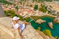 Woman on top of Dubrovnik city of Croatia