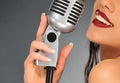 Woman with a retro microphone Royalty Free Stock Photo