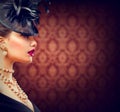 Woman with Retro Styled Hairstyle and Makeup Royalty Free Stock Photo