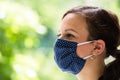 Woman In Reusable Cloth Face Mask