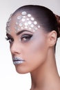 Woman with rhinestone fashion make up