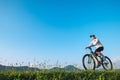 Woman ride a bike: summertime activity