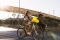 Woman riding a bicycle with baloons and fancy stuff in Izmir and on the day of Fancy Woman bike tour