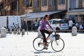 A woman riding a bicycle