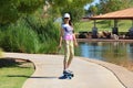 Woman Riding an Electric Skateboard